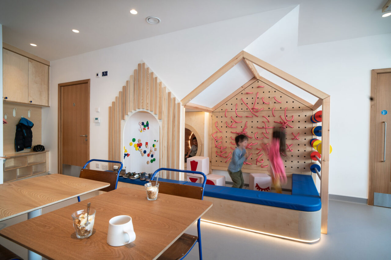 Wood and bright colours in the play area at Goldfinch in Westbury on Trym